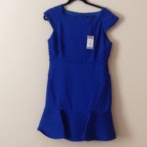 Brand new tight dress with flutter bottom